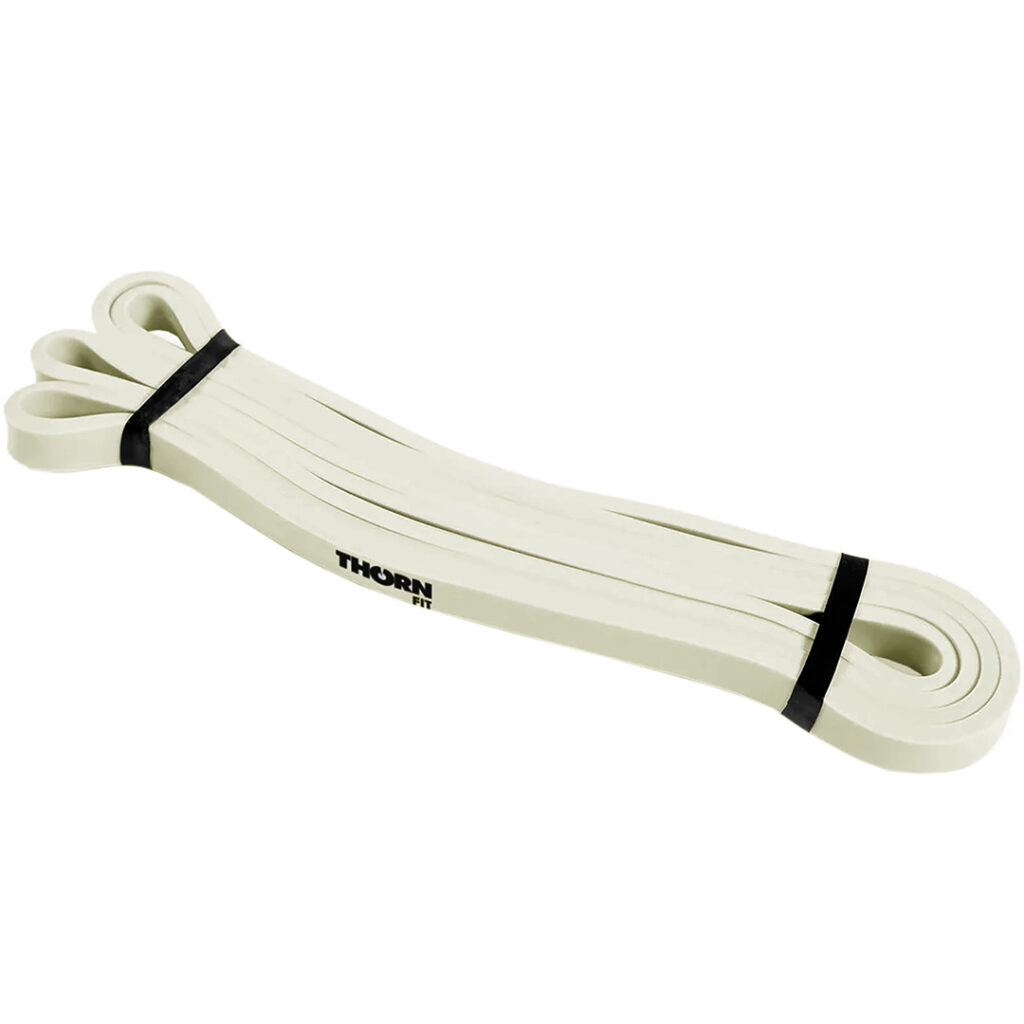 Guma do ćwiczeń lateksowa Thorn Fit Latex Superband 208x1,30x0,45 cm super mini beżowa